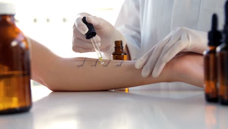 Close-up-of-woman-therapist-doing-allergy-tests-on-her-patient