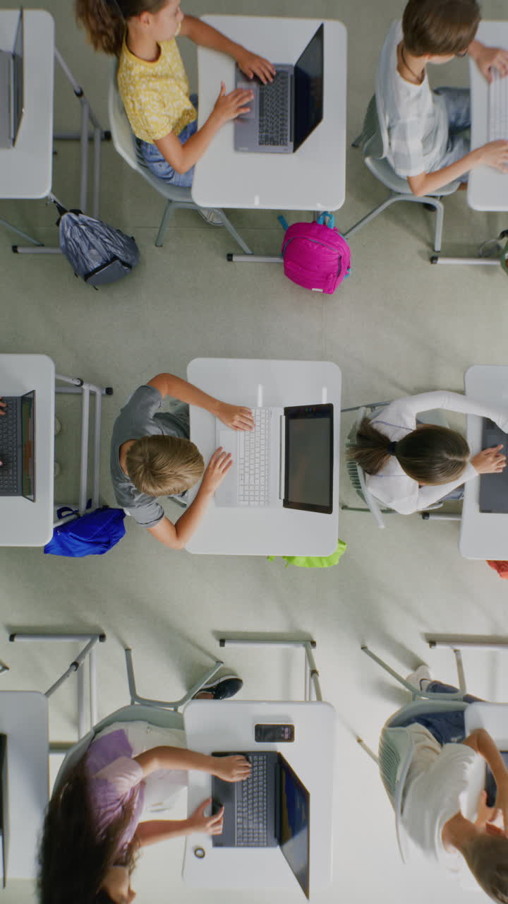 Elementary School Children Using Computers Doing Creative 3D Design Projects