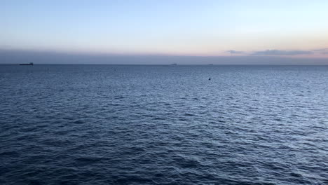 Sunset-on-the-ocean-horizon-on-a-breezy-evening