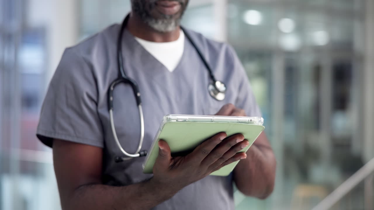 Doctor Using Tablet in Hospital