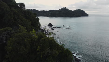 drone reveals scenic landscape in manuel antonio beach, costa rica