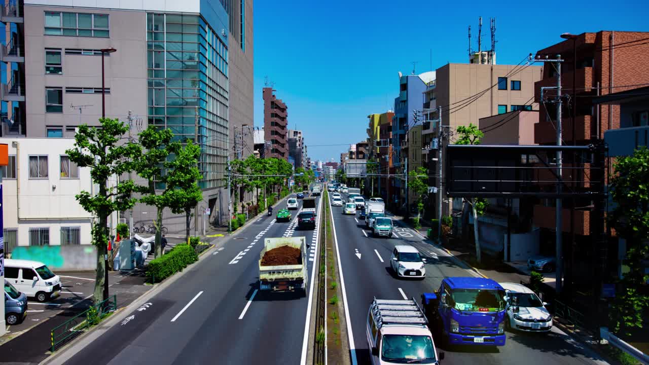 도쿄의 도시 거리에서 교통 체증의 타임 스 긴