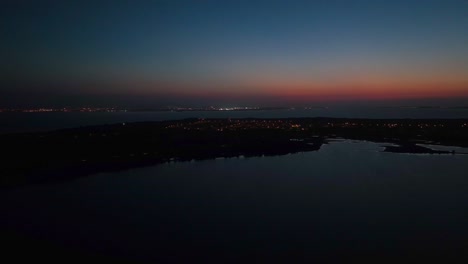 drone shot showing island of kinmen 金門 in taiwan during golden sunset with dark