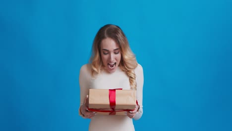 woman opening a gift