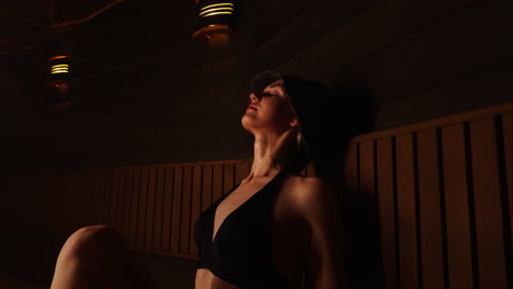 woman relaxing in a sauna
