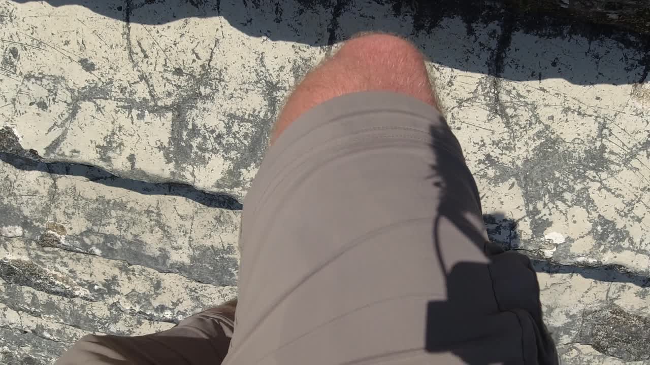 Climbing the steps of the Xunantunich Mayan Ruins in San Jose Succotz, Belize