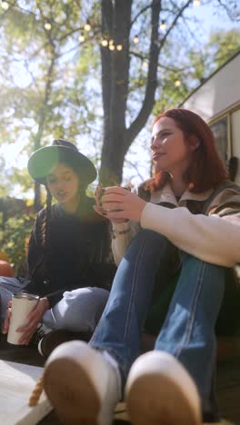 two friends enjoying an autumn afternoon outdoors