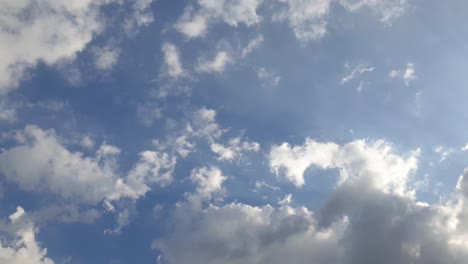 Mid-afternoon-thunderstorm-rain-clouds-forming-and-blending-across-the-african-horizon-time-lapse,-noise-free-4k-footage