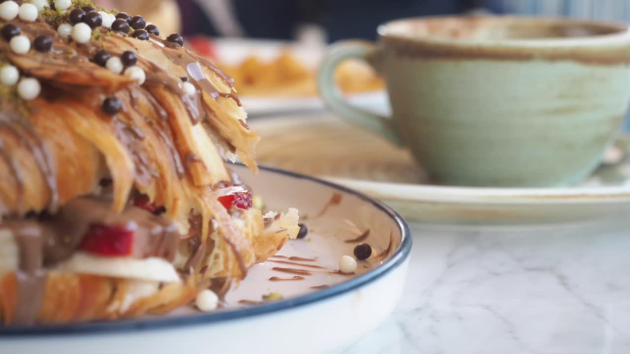 Delicious Croissant with Chocolate and Fruit