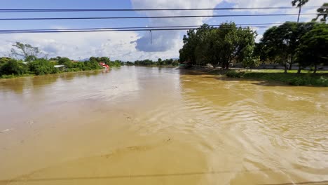 scene of a flooding town of chiang mai province in northern thailand