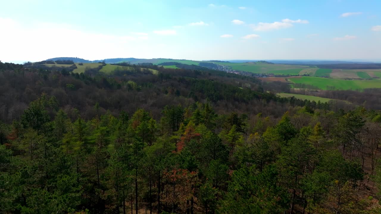 Lush Spring Landscape With Wooded Hills - Aerial Drone Shot