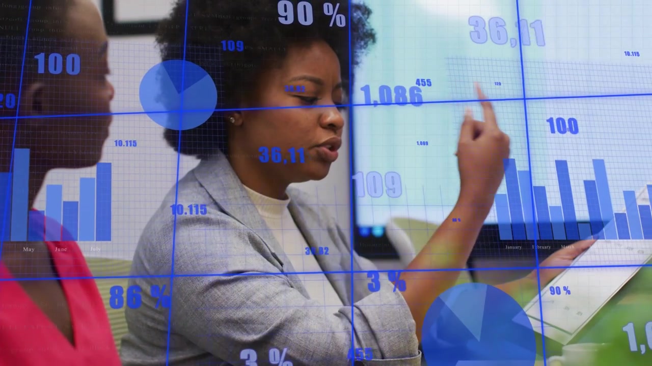 Centered woman studying report and explaining data during business review, blue charts overlaying