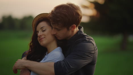 sensual couple expressing feelings outdoors