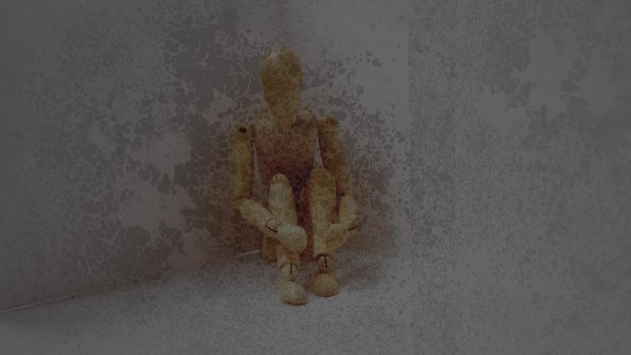Textured scratched overlay against stressed wooden figurine with copy space on grey background