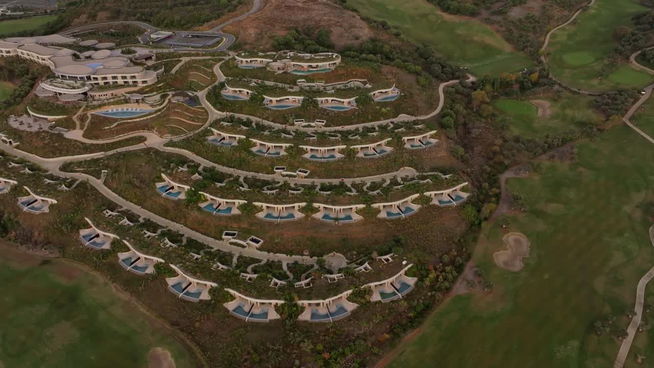 Aerial view of drone capturing seaside resort and clear blue sea