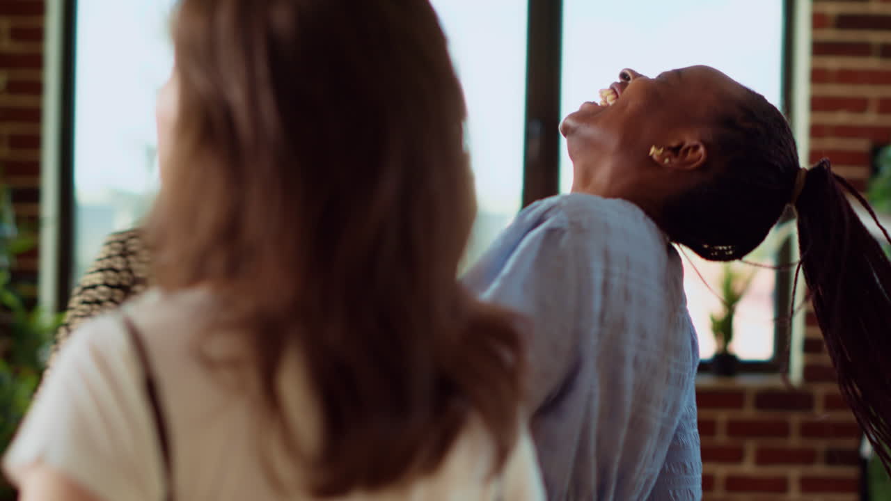 Close up shot of woman dancing around house during apartment party