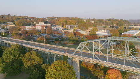 aerial flyover of the walnut street walking bridge in chattanooga, tn with the north shore in the background