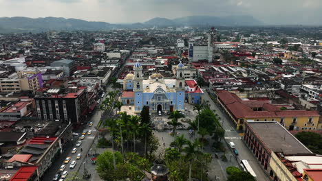 drone shot toward the cathedral, in cordoba, partly sunny day in veracruz, mexico