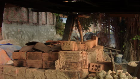 An-establishing-shot-captures-the-beauty-of-Thanh-Ha-pottery-village-in-Vietnam,-showcasing-the-traditional-pottery-making-techniques-and-unique-craftsmanship