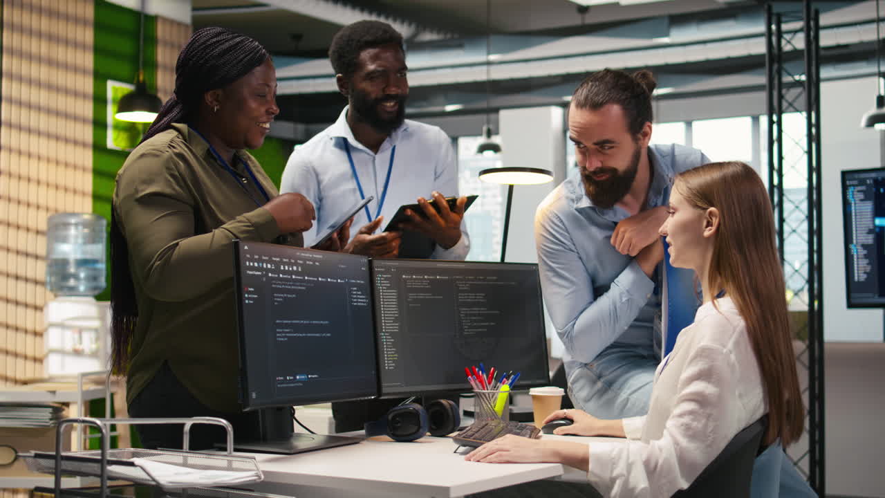 Startup Newcomer Making Friends In Office, Learning How To Use Machine Learning