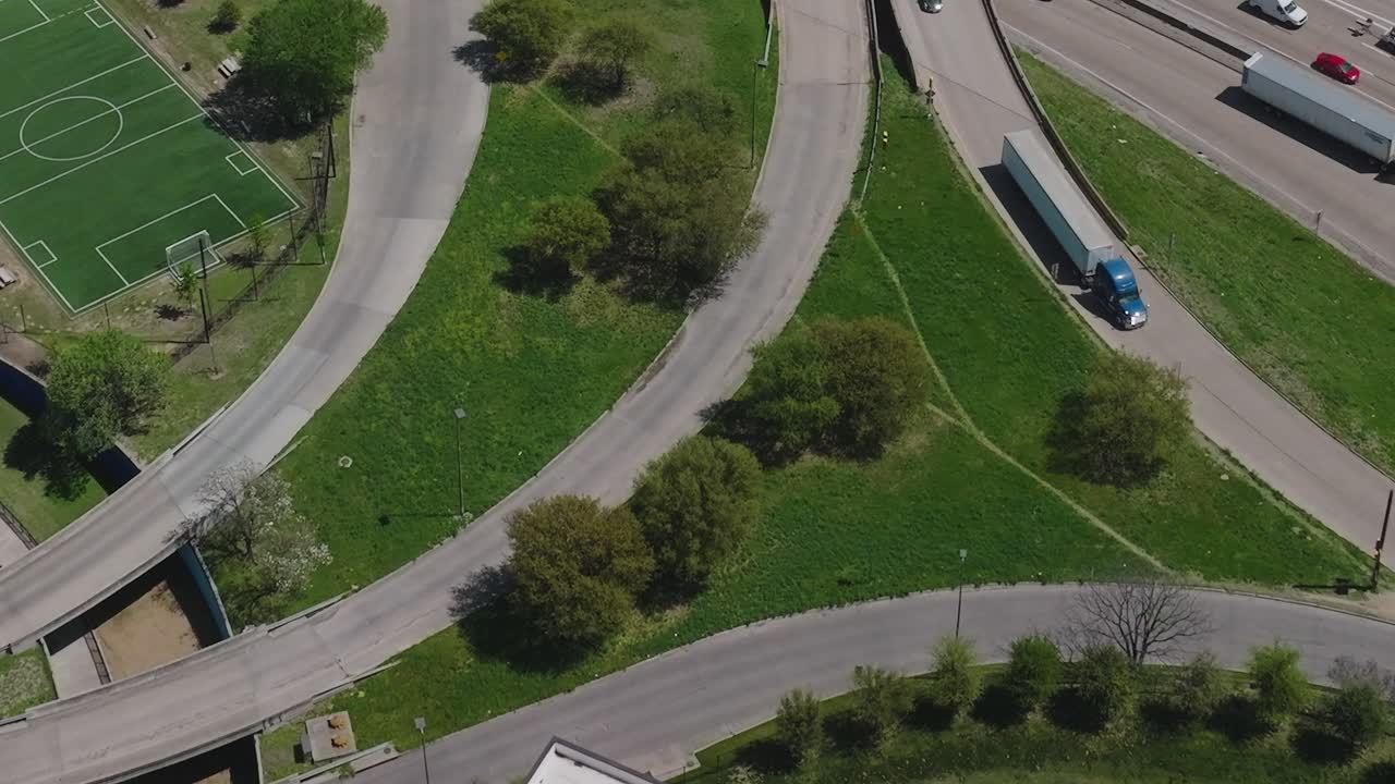 View of downtown Dallas with roads and fields in Texas from above