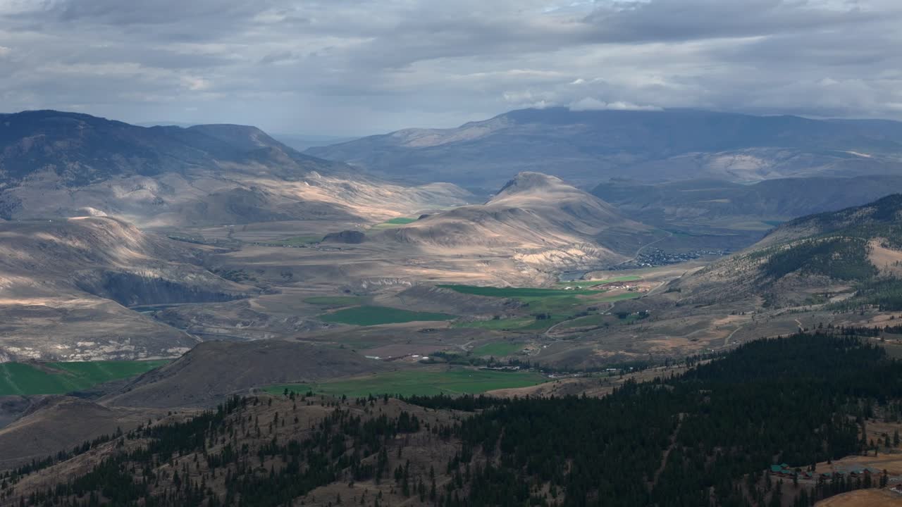 Aerial Overlook of Ashcroft, British Columbia's Natural Setting: Pristine Forests and Semi-Arid Desert during Cloudy Weather