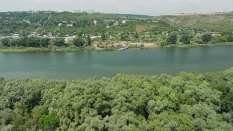 crossing-of-two-rivers-in-the-direction-of-a-moored-ship-in-a-small-settlement