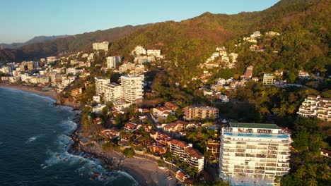 rocky mountainous coastline beach in playa amapas in puerto vallarta mexico, aerial