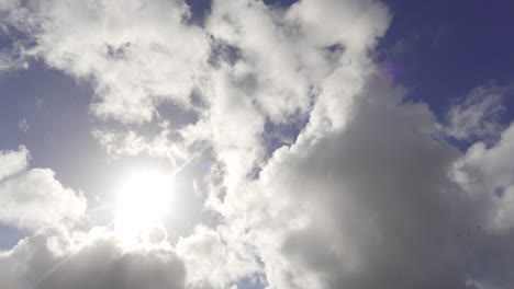 timelapse of clouds on a sunny blue sky