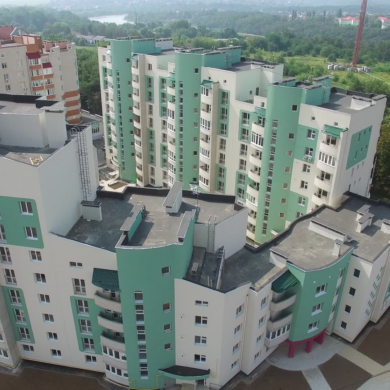 Beautiful view opening of a modern building being built in a new residential complex. High-rise house apartment in the city. Motion camera bottom top