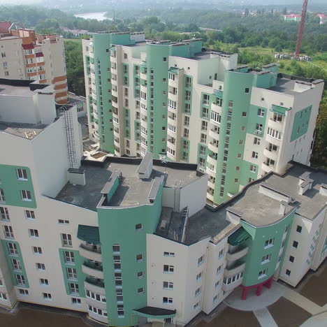 beautiful view opening of a modern building being built in a new residential complex. high-rise house apartment in the city. motion camera bottom top