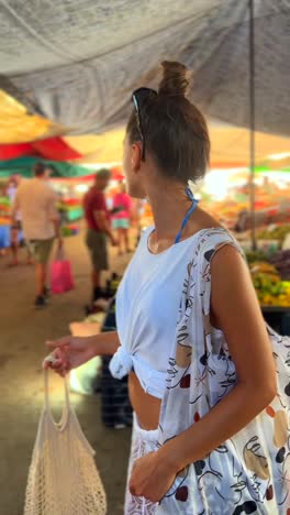 woman exploring a vibrant street market