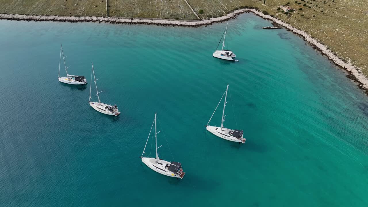 Yacht And Sailboats Floating In The Blue Sea In Kornati, Croatia. - aerial shot