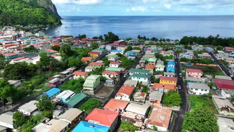 Aerial-establishing-shot-of-multicolored-houses-and-homes-of-Soufriere-St-Lucia