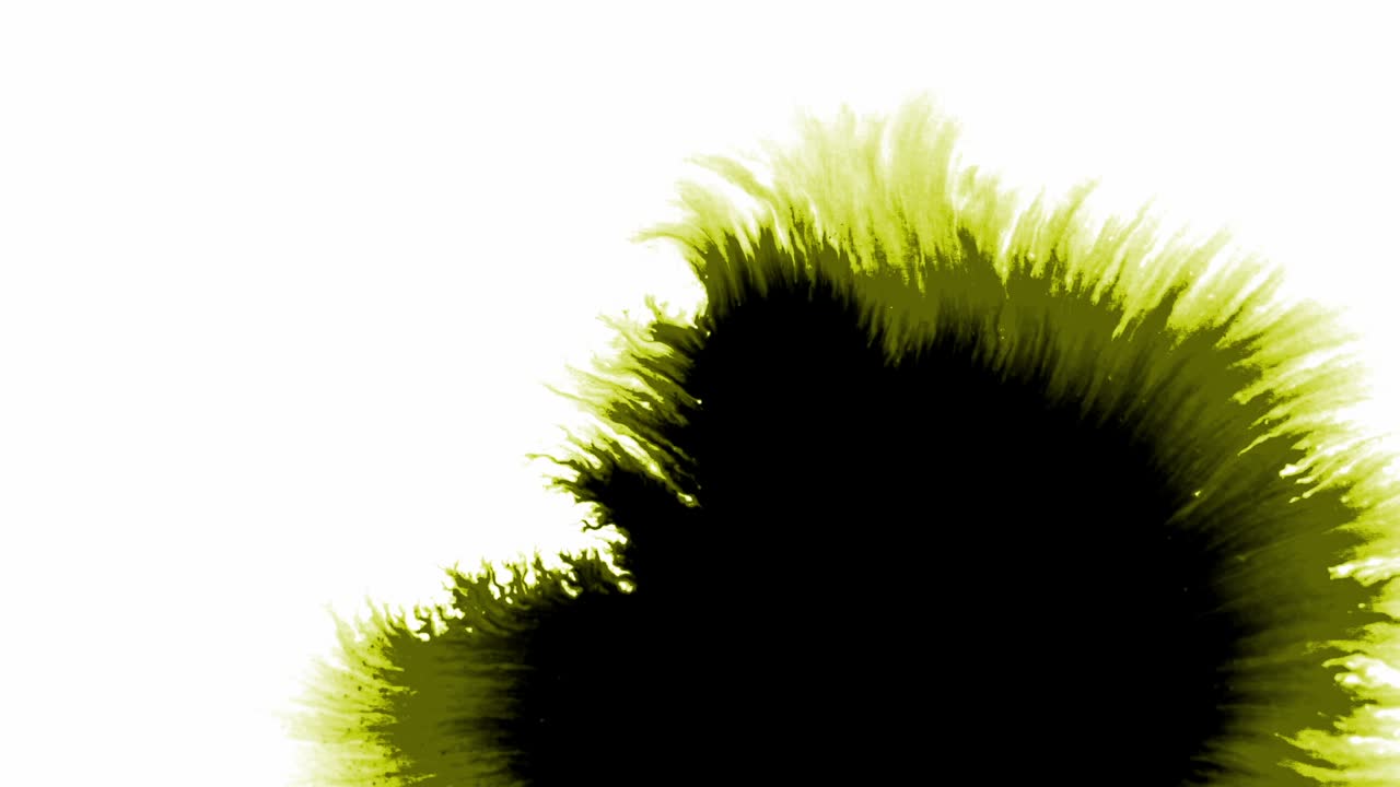 색 바탕에 퍼지는 노란색 잉크의 스프레이치와 반점