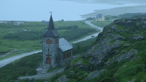 King-Oscar-II-chapel-in-Grense-Jakobselv,-Norway-in-deep-mist