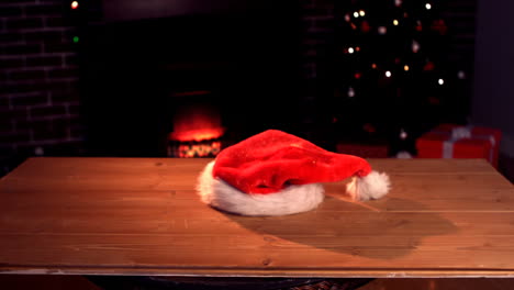 Christmas-hat-falling-on-table