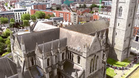 view over st patrick's cathedral in dublin, ireland - aerial reveal