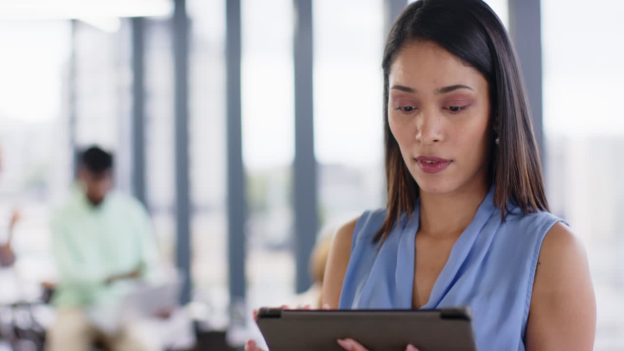 Standing confidently in office, businesswoman looking at camera, professional setting, copy space