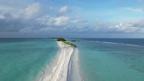 aerial above fine white sand beach paradise of dhigurah island sandbank, maldives