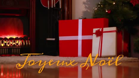 joyeux noã«l written over christmas presents