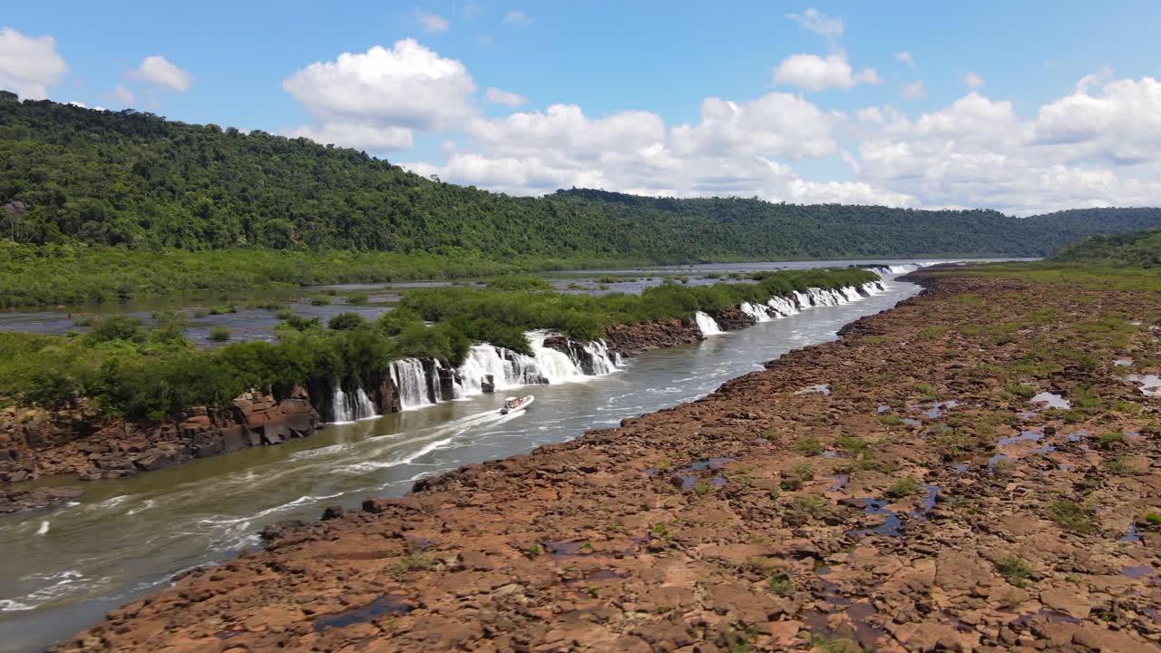Spectacular views of the Saltos del Mocon&aacute; or Salto do Yucum&atilde; captured on an incredibly clear and blue day, showcasing the majestic beauty of the longitudinal waterfalls on the Argentina-Brazil border