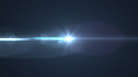 bright blue spot of light glowing against black background