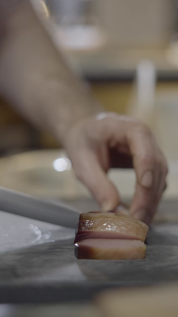 Close-up of a Chef's Hand Preparing Food