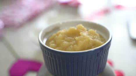 Slow-pan-displaying-applesauce-in-a-bowl-making-a-special-valentine's-day-cake-vegan-chocolate-cake-eggless-plant-based-dairy-free