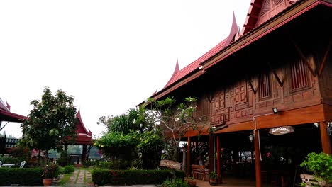 beautiful wooden architecture surrounded by lush greenery