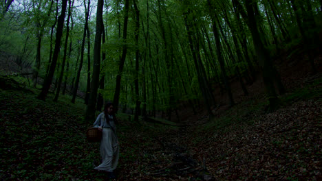 woman walking through the woods