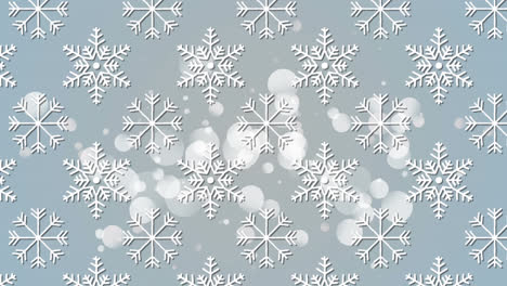 animation of multiple snow flakes over glowing spots on blue background