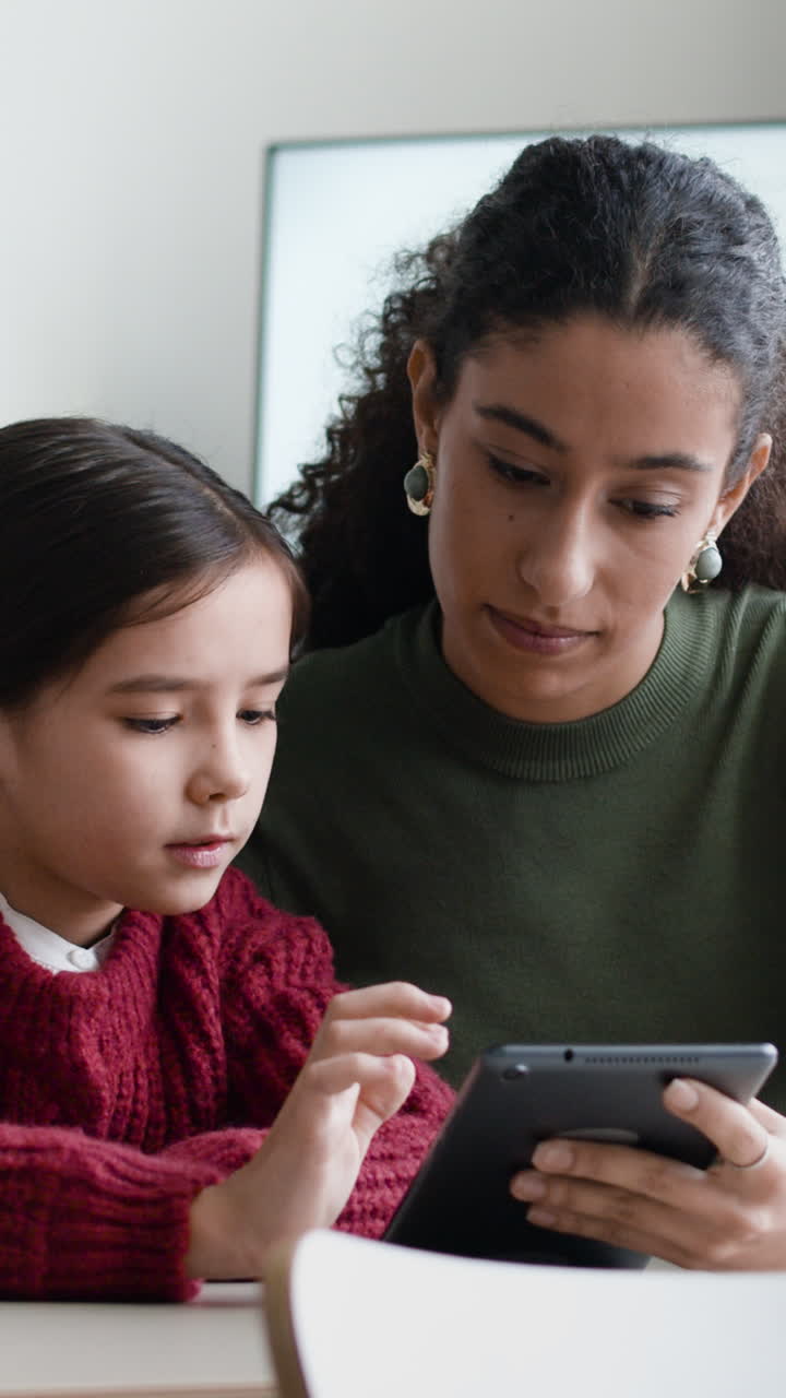 Mother and Daughter Learning Together