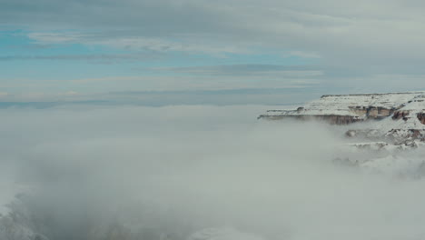 Snow-fell-in-Cappadocia,-followed-by-foggy-weather-and-time-lapse-drone-footage